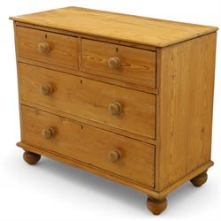 Victorian stripped pine chest, rectangular top over two short and two long drawers with turned wooden knob handles, on bun feet