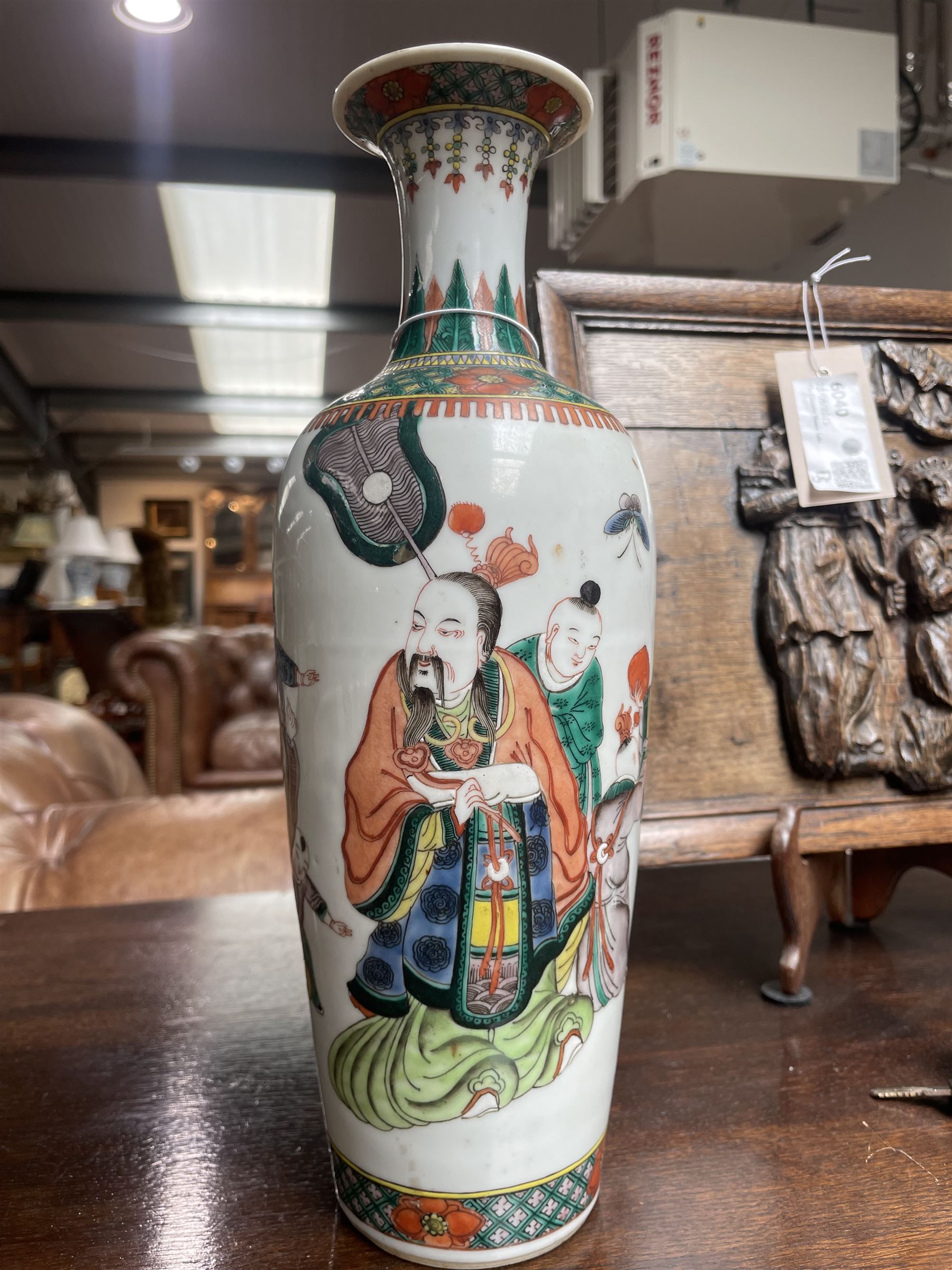 Chinese Kangxi famille verte vase of baluster form with fluted rim, decorated with sage and attendants within a trellis border, with four character Kangxi double ring mark beneath, H31cm 