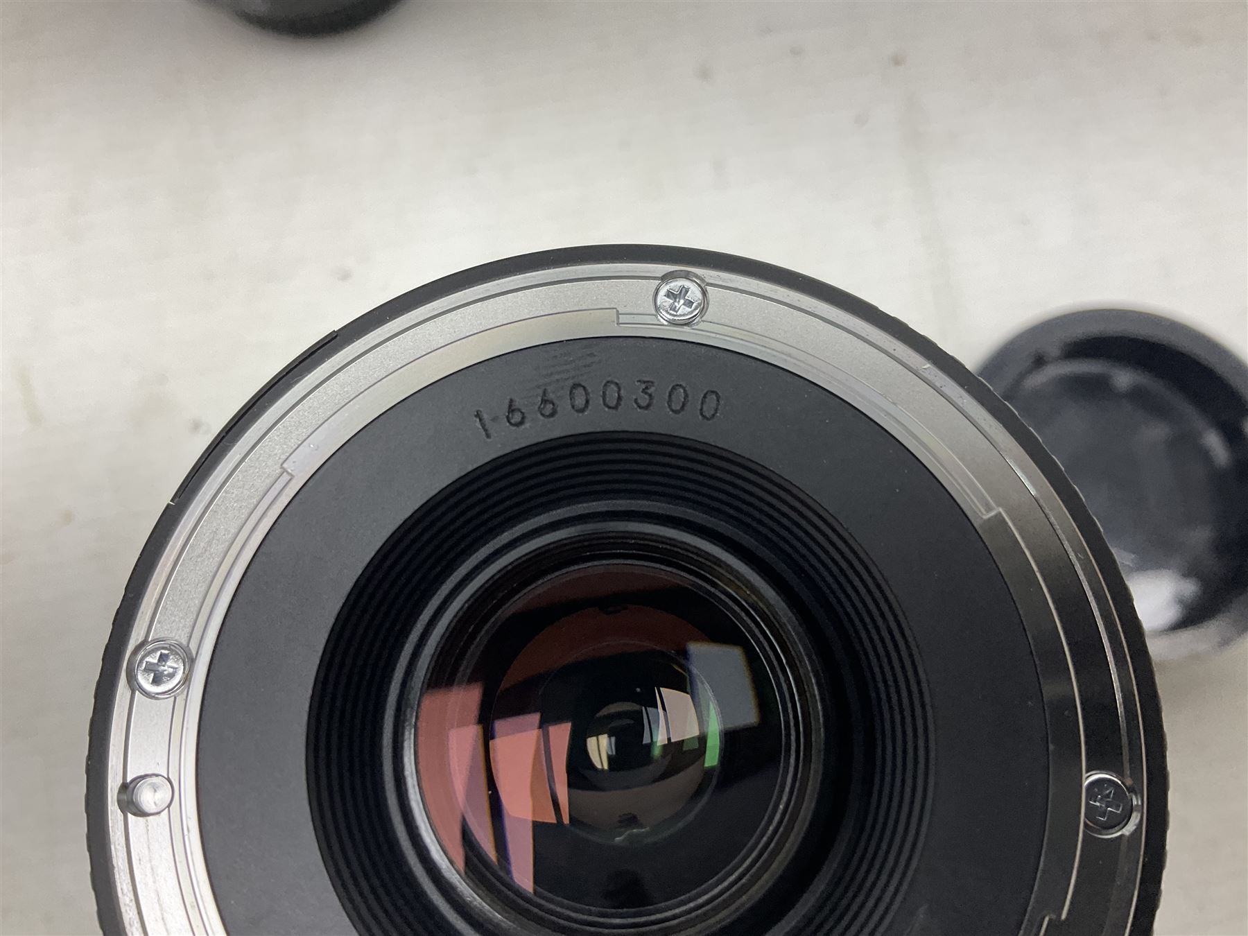 Canon Eos 7D camera body, serial number 3261306344, with 'Canon Ultrasonic EF 24-105mm Macro 0.45m/1.5ft Ultrasonic' Lens, 'Canon Zoom EF 75-300, 1;4-5.6 III' lens and Teleplus Pro 300 lens, together with tripod and original camera box 