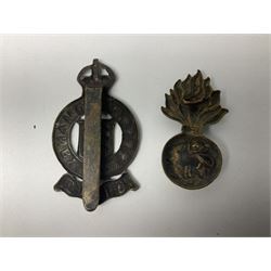 Nineteen Yeomanry metal cap badges including Derbyshire, Northamptonshire, Essex, Glamorgan, Staffordshire, City of London, Surrey, Shropshire, Hertfordshire etc; together with eleven Fusiliers badges including Lancashire, Royal Welch, Northumberland etc (30)