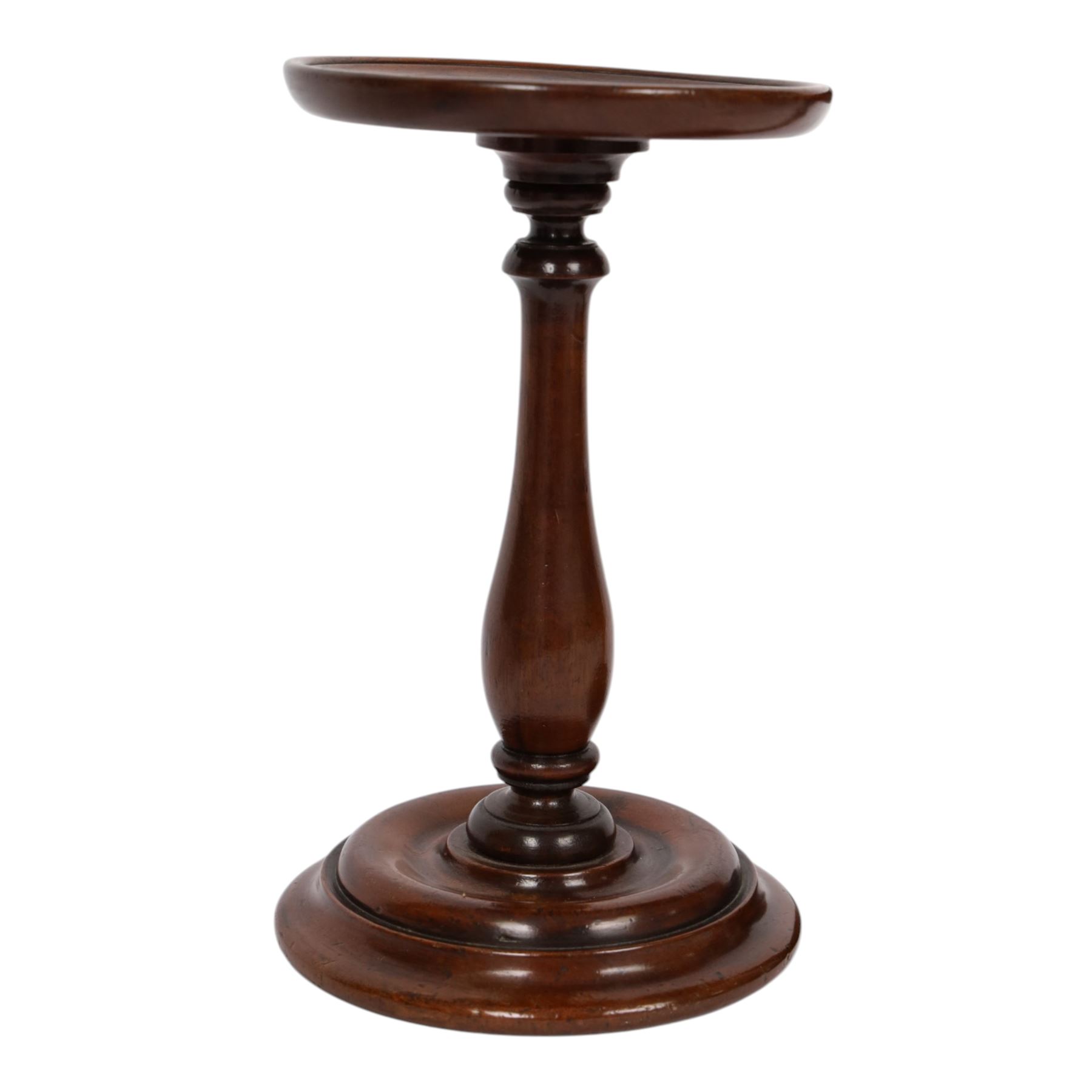 Pair of 19th century turned mahogany candle stands, each with circular top upon a baluster stem and circular stepped base, H25.5cm