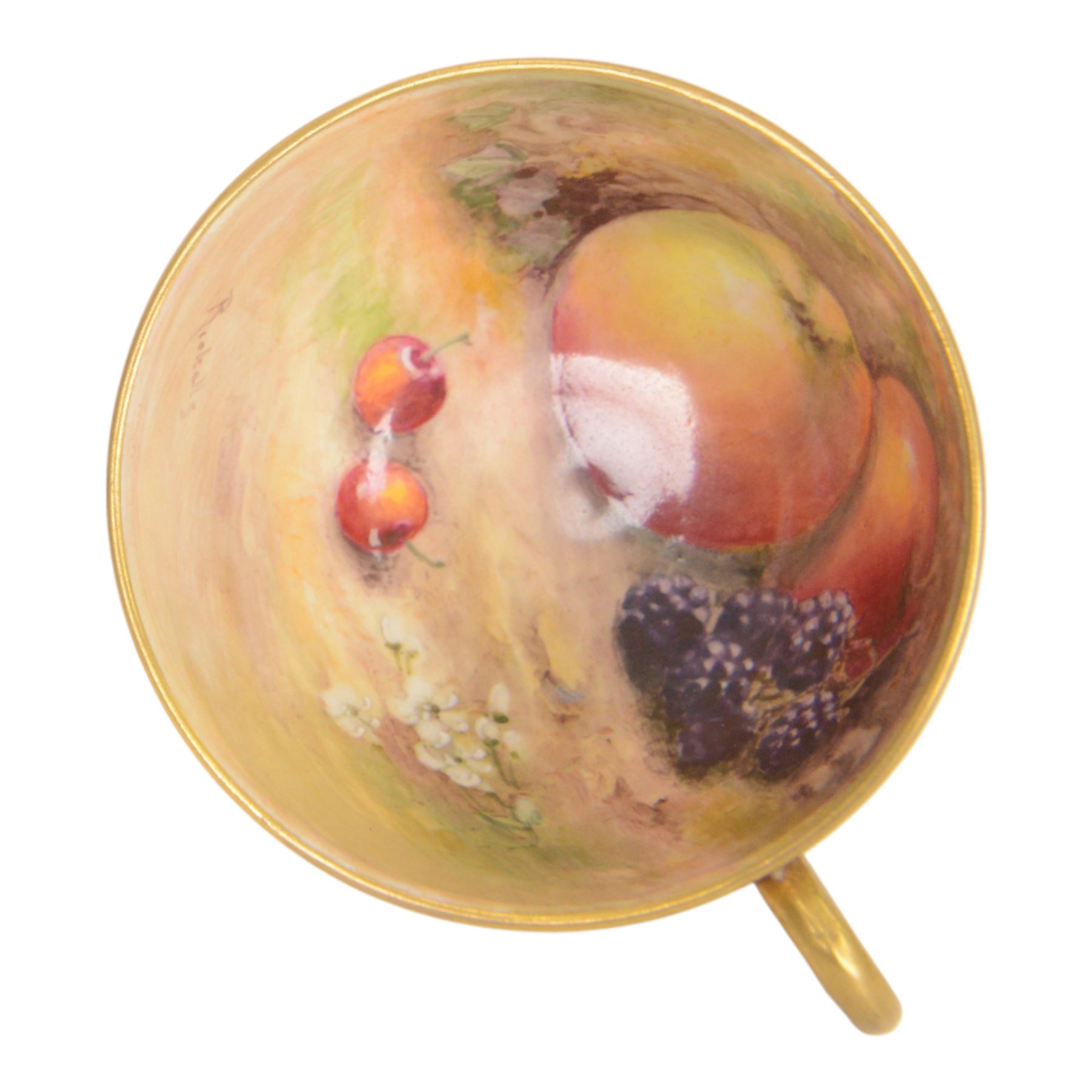 Royal Worcester fruit painted cabinet teacup and saucer, interior hand painted with apples, blackberry and cherries upon a mossy ground, the cup exterior and centre of saucer gilded, cup and saucer signed Rickells, each with puce coloured printed marks beneath, H7cm