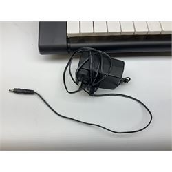 Yamaha EZ-220 electric keyboard, in case, untested 