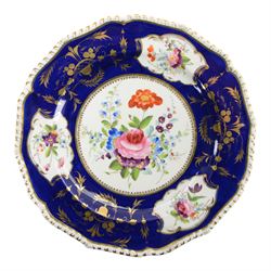Collection of 19th century porcelain dessert wares, comprising Bloor Derby dish, circa 1825, Spode Felspar shaped oval dish, circa 1820, Ridgeway shaped oval footed dish with twin handles, circa 1840, Ridgeway dish, circa 1820, and tazza and dish, probably Minton, pattern 4810, each decorated in various patterns with floral sprays against dark blue grounds and heightened with gilt
