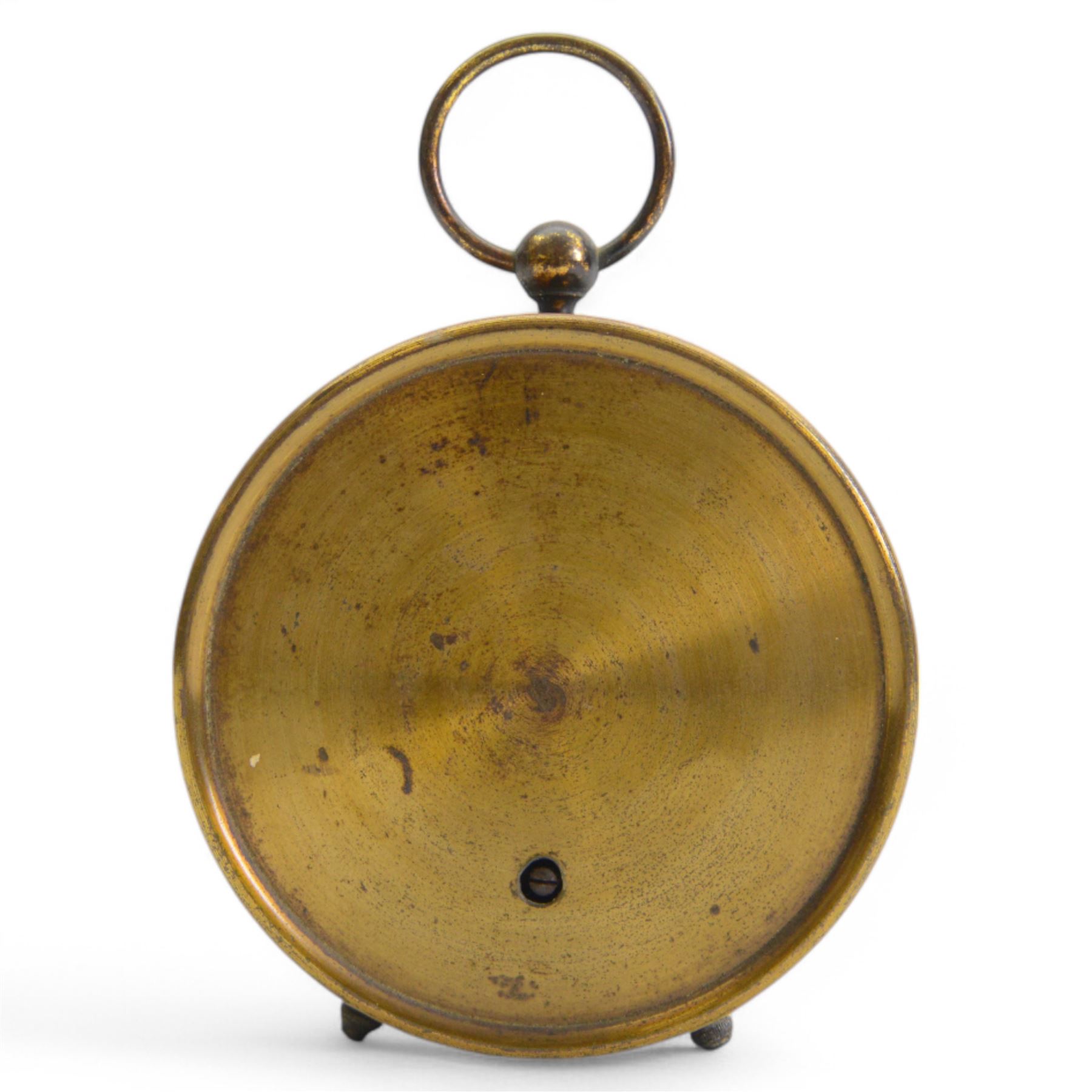 French- late 19th century desktop aneroid barometer in a circular gilt metal case with carrying ring, 3.5 inch paper printed register with predictions and barometric air pressure, with a steel indicating hand and brass recording hand, adjustment screw to the rear.