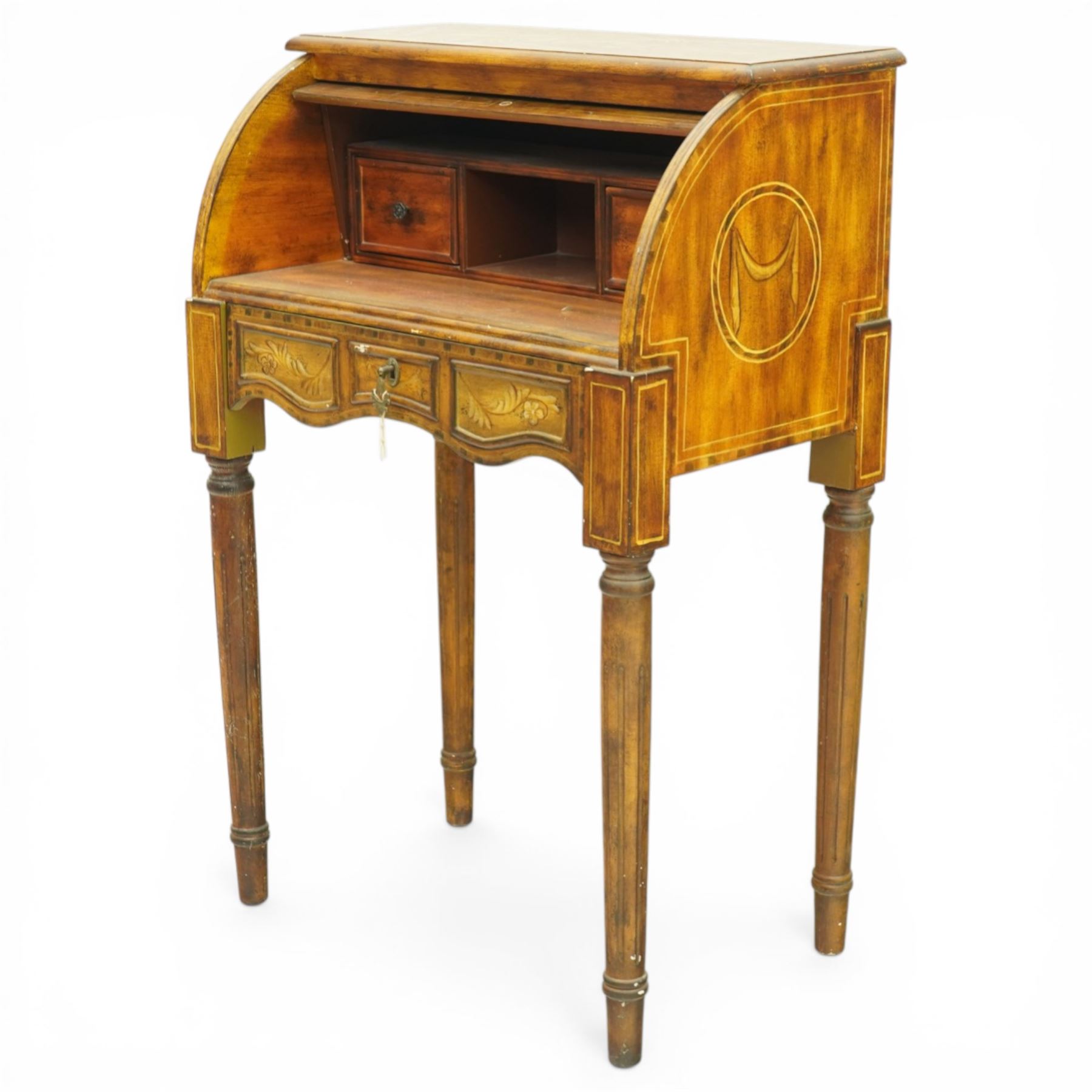 20th century mahogany cylinder desk in the Sheraton manner, the inlaid fall enclosing a fitted interior above a shaped drawer, raised on slender tapering legs