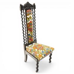 19th century Carolean design oak hall chair, carved cresting rail over barley-twist uprights, high back and loose seat upholstered in wool-work foliate tapestry (W46cm H116cm); 19th century elbow chair mahogany with spiral turned centre rail and roundel-applied frieze (W56cm H85cm)