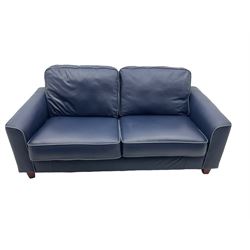 Pair of two seat sofas upholstered in soft blue leather