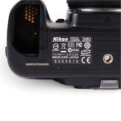 Nikon D80 camera, serial no. 2017183, with Nikon AF Nikkor 1:2.8 35-70mm lens, serial no. 312406, with Sigma carry case
