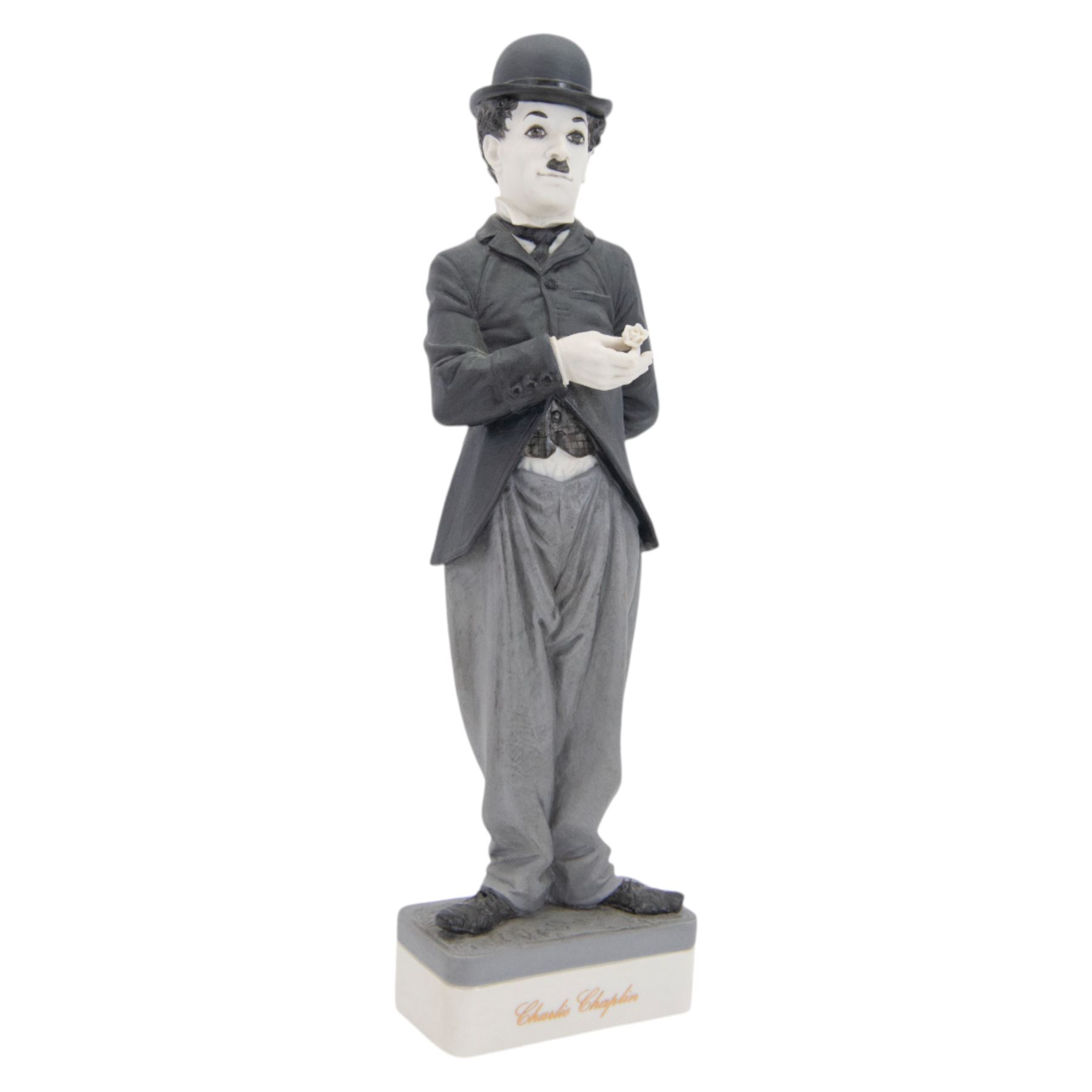 Two Spanish Algora Personajes Del Cine figures, modelled as Charlie Chaplin and Groucho Marx, with printed marks beneath, both with certificates of authenticity, H35cm