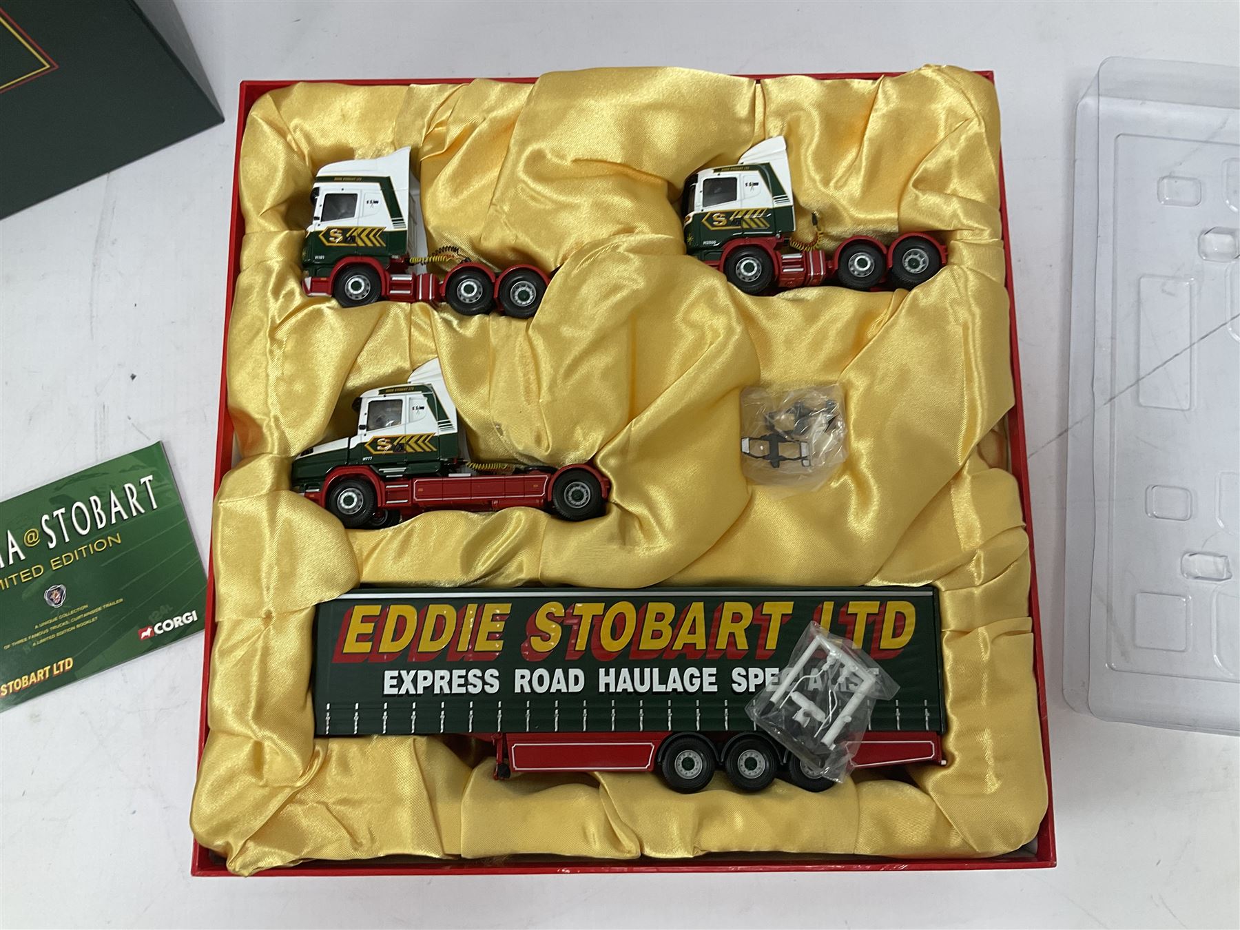 Corgi - three limited edition Eddie Stobart sets - 76901 30th Anniversary 1970-2000; boxed with delivery packaging; CC99155 Scania@Stobart; and CC86610 The Eddie Stobart Story; both boxed (3)