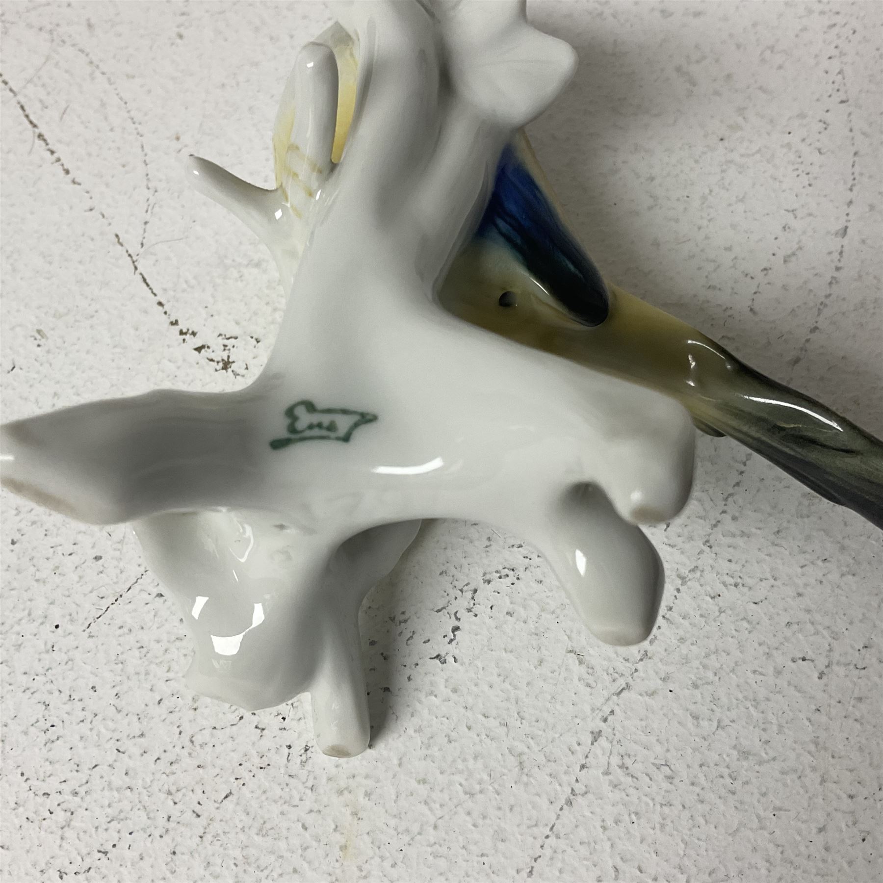 Seven Karl Ens bird figures, including barn owl, eagle owl, blue tit, budgerigar etc, all with mark beneath, tallest H17cm 