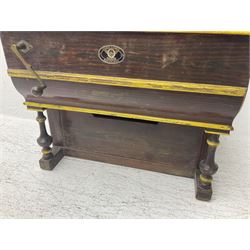 Faventia Half size miniature Spanish barrel piano with a 40cm cylinder playing tunes on a 37 note movement including woodblock and triangle, in a painted case with silk embroidered decoration to the front.  Vicente Linares, Barcelona trade label, with original crank handles, stringing, hammers action, tuning pins and cylinder
