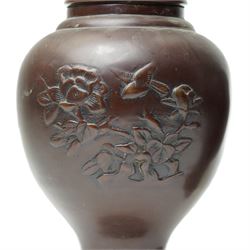 Pair of Japanese bronze vases, with twin handles in the form of dragons, decorated with flowers and traditional motifs to the neck and body, H31cm (2)