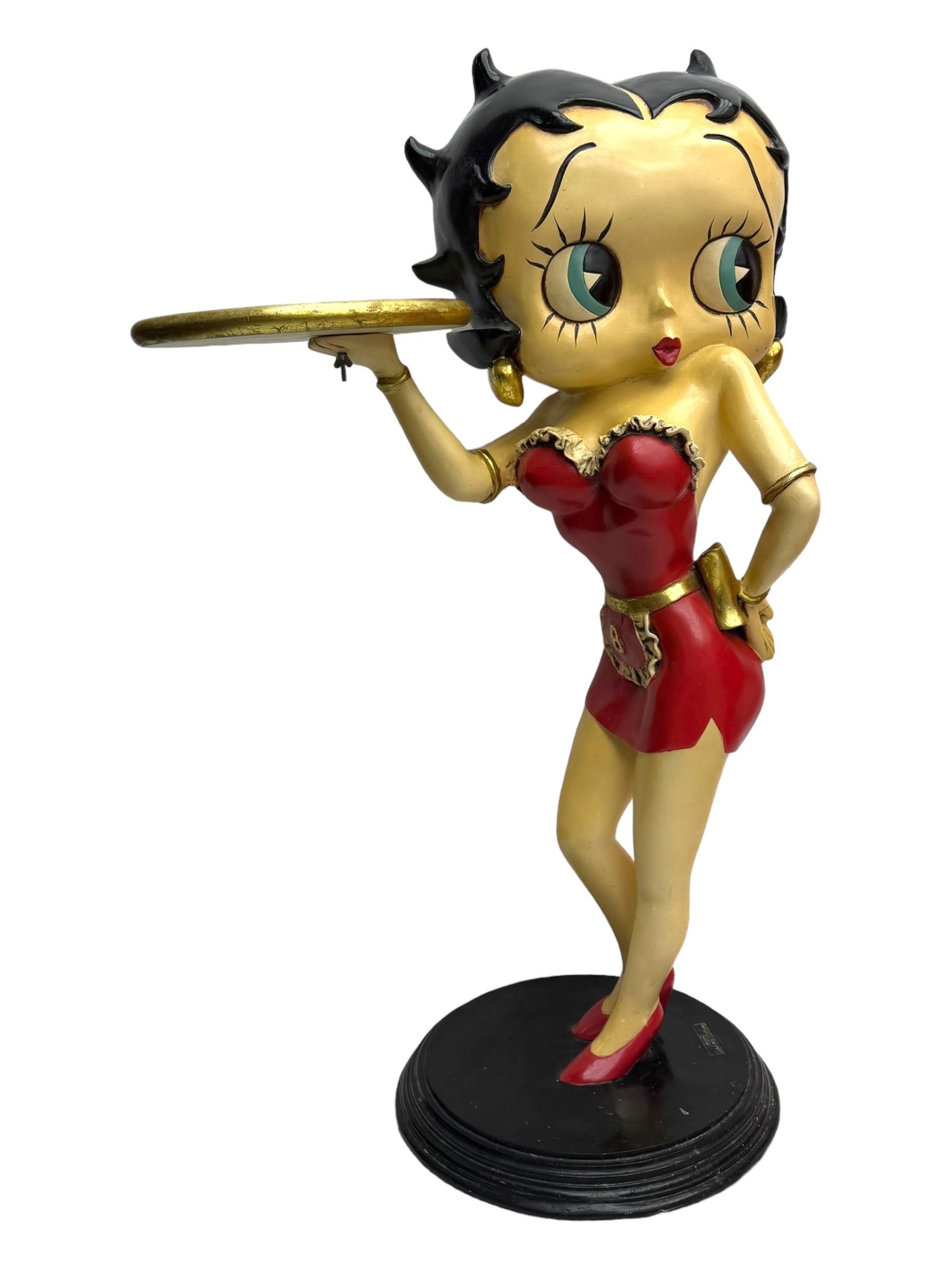 Contemporary Betty Boop waitress figure, modelled standing with one hand holding a circular tray, dressed in a red dress with gold accents, on a black circular base