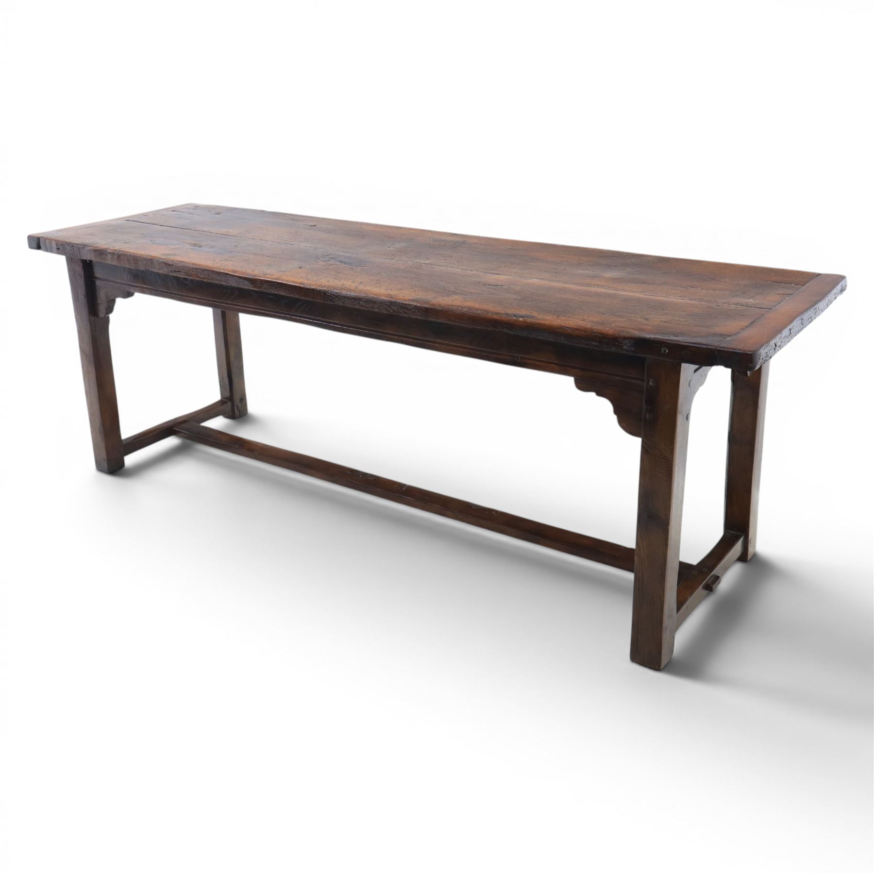 Large country made oak farmhouse dining table, on two plank construction, raised on square supports united by an undertier 