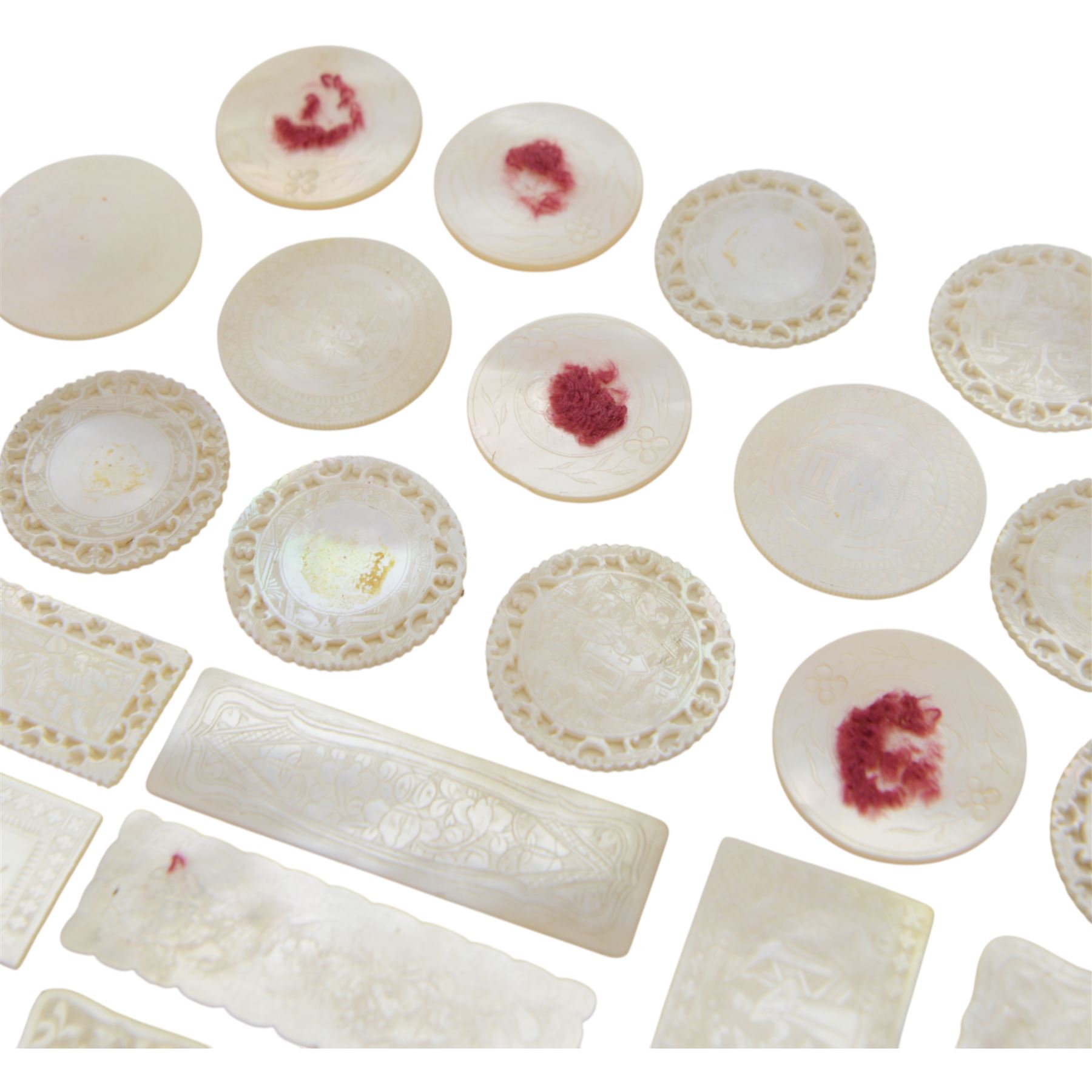 Chinese mother of pearl gaming tokens, of varying shape and design, including carved and engraved examples