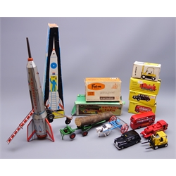  Hungarian Holdraktin-plate rocket H39cm, Britains die-cast Farm Rake No.9506 and Timber Trailer No.129F, three Budgie die-cast models Routemaster Bus No.236, Railway Engine No.224 and London Taxi Cab No.101 and R.W.Model Hyster Fork Lift Truck, all boxed (7)  