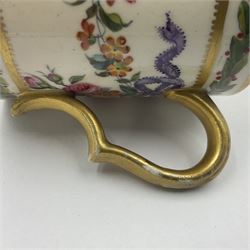 Sèvres soft paste porcelain coffee can and saucer with date code for 1780, painted with pink oval panels bordering bouquets of flowers, united by swags of flowers tied with purple ribbons, within laurel leaf borders, interlaced LL monogram enclosing date letters CC above painters marks for Nicquet, coffee can H7.5cm, saucer D15cm