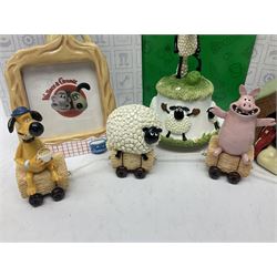 Border Fine Arts Shaun The Sheep Tractor Train and musical figure, together with a Wallace and Gromit photograph frame and a Gromit cruet sett, three in original boxes  
