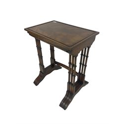 Regency design mahogany nest of three tables, rectangular top with banded edge and applied moulding, raised on turned supports 