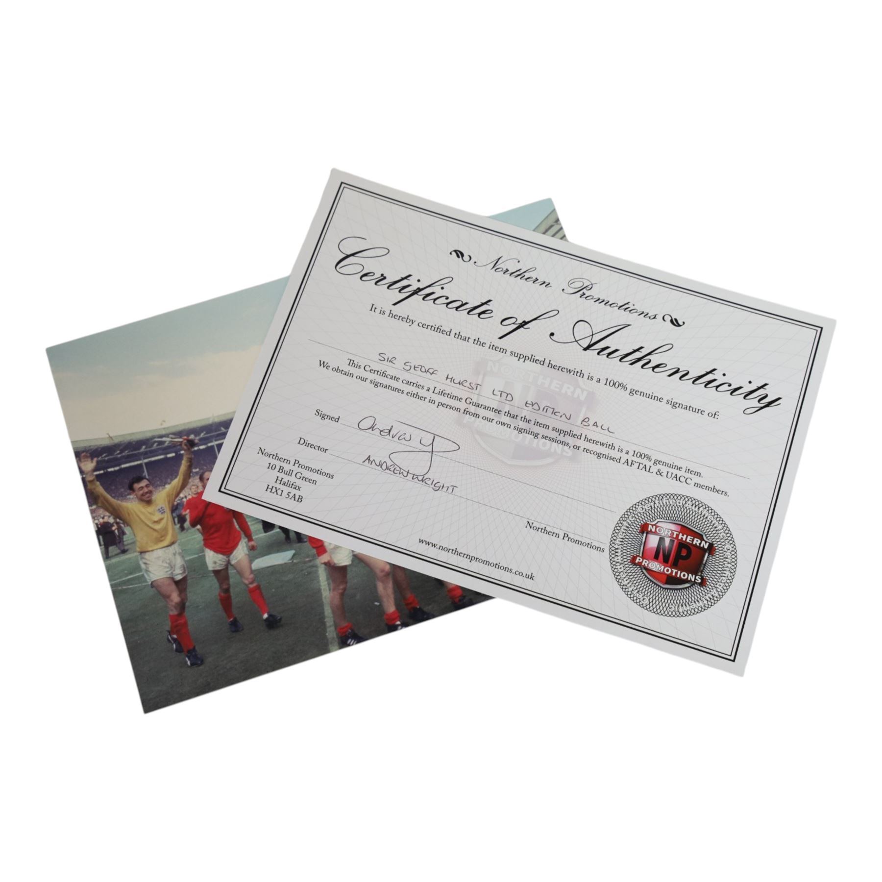 Limited edition football signed by Geoff Hurst to commemorate 50 years since England won the Football World Cup in 1966, a gold coloured football signed in black marker pen to one side, the ball stamped England 66W Celebrating 50 Years, contained within a Perspex display case, with certificate of authenticity from Northern Promotions