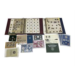 Great British and World coins, including various United States of America unofficial coin sets, Queen Elizabeth II Guernsey 1966 four coin set in The Royal Mint green case, Canada 1977 silver dollar, Isle of Man four coin crown set, Great British pre decimal coinage etc
