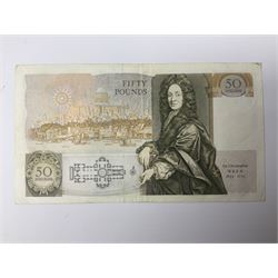 Twenty six mostly Bank of England banknotes, to include Peppiatt issues comprising one pound and ten shilling notes serial numbers ‘A97D’ and ‘09J’, Gill fifty pound note serial no. ‘D52’, O’Brien Blue Lion and Key series with helmeted Britannia to front serial no. ‘J23’, and further issues including British Armed Forces special vouchers, housed in plastic sleeves 