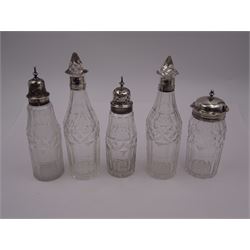 Late 18th century silver cruet stand, of oval form, with pierced sides upon four bun feet, hallmarked to handle Hester Bateman, all other hallmarks indistinct, together with five matched silver mounted cut glass cruet bottles, including some later Victorian examples, hallmarks predominantly indistinct, stand H20cm