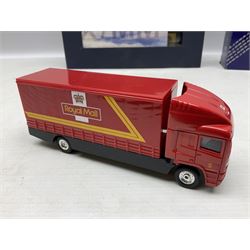 Royal Mail Millennium collection memorabilia, including presentation packs, with the essential guide books and various Corgi diecast vehicles