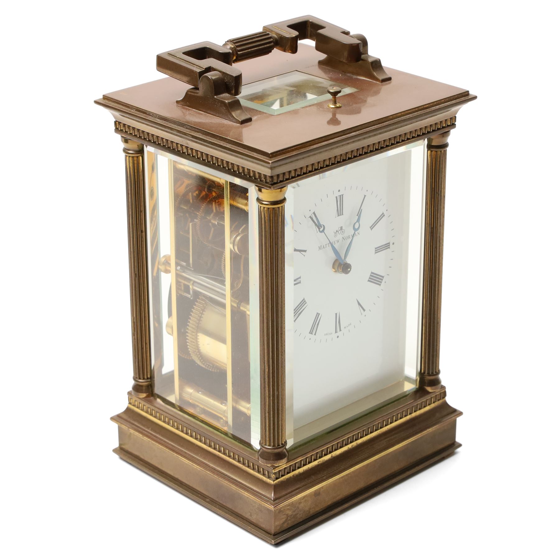 Matthew Norman - Modern repeating carriage clock with Swiss movement, white dial, brass and bevelled glass case H14cm, boxed and a miniature carriage clock by the same maker H9cm, boxed (2) 