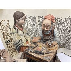 Four Capodimonte figure groups, to include tramp figures, shoemaker figure etc