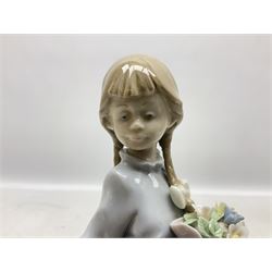 Three Lladro figures comprising, Pocket Full of Wishes no 7650, School Days no 7604 and Spring Bouquets no 7603, all with original boxes, largest example H26cm  