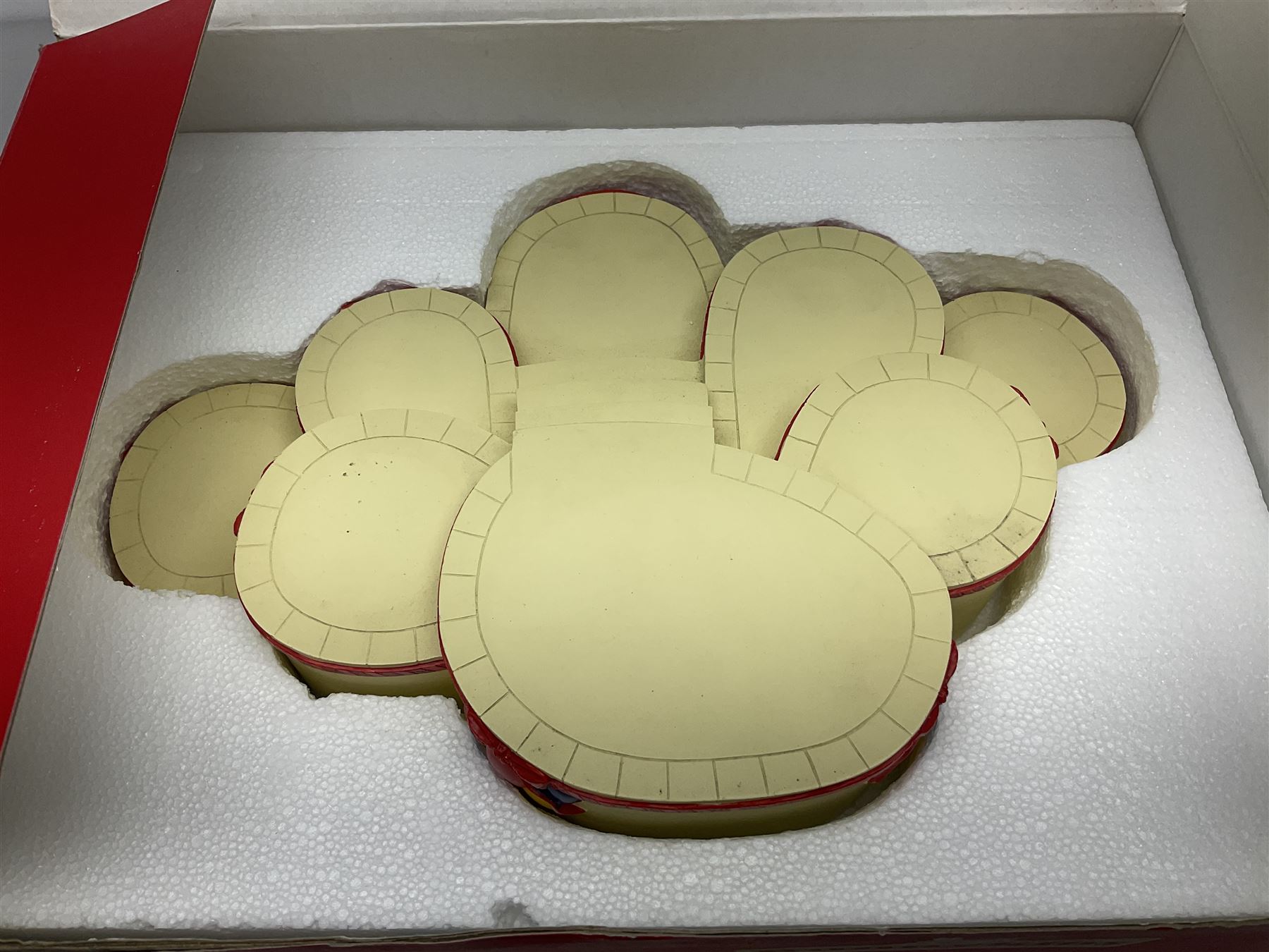 Royal Doulton The Mickey Mouse Collection Pluto figure, Coalport Characters The Snowman Dressing Up figure, three Royal Doulton Bunnykins figures comprising Policeman, Morris Danger and Eskimo, and display stand, Royal Doulton John Beswick Tiggy Winkle, Royal Albert Beatrix Potter Peter Postbag and three Goebel Hummel figures, all boxed