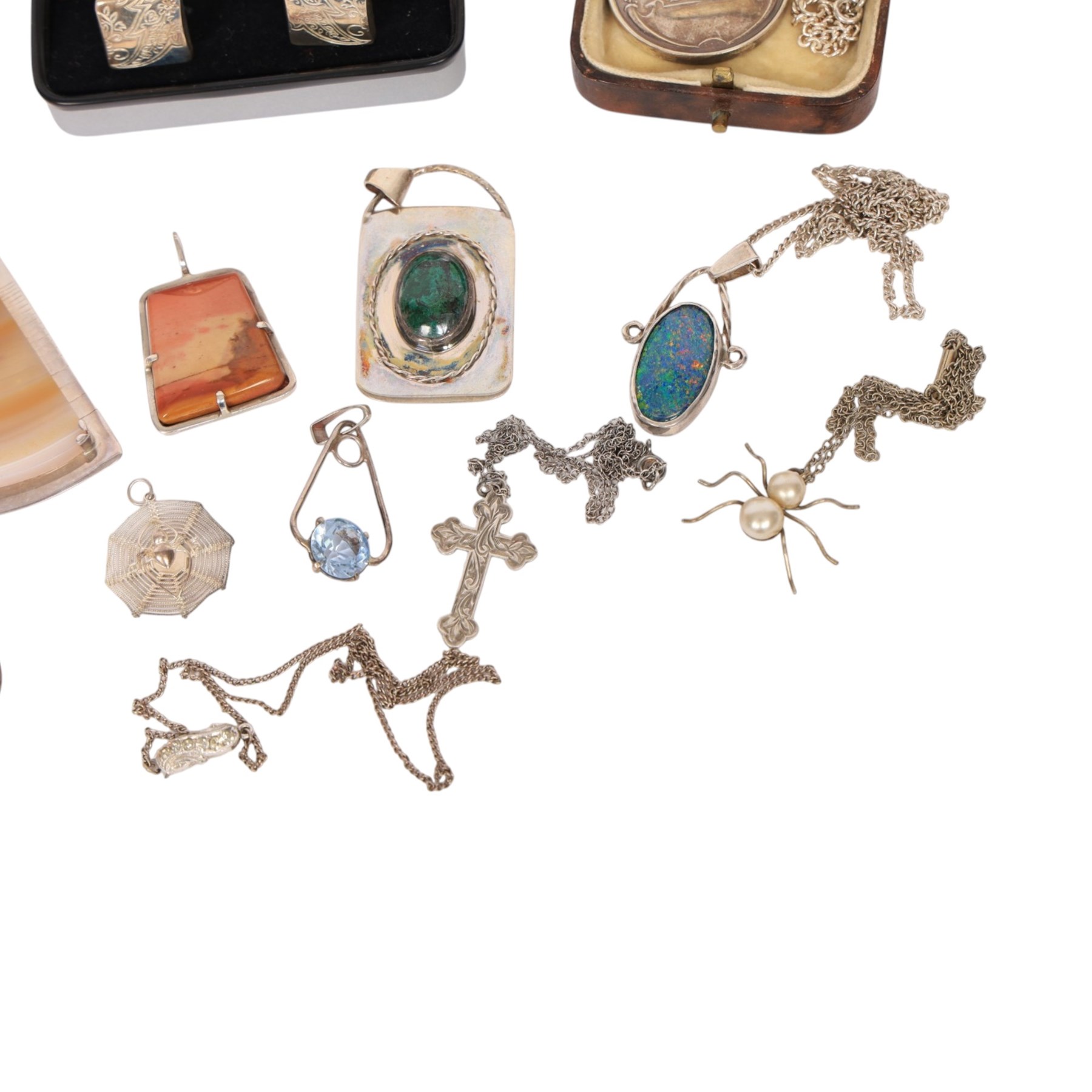 Silver jewellery, including hockey medal pendant, spider necklace, stone set pendants, cross pendant and a pair of Liberty cufflinks