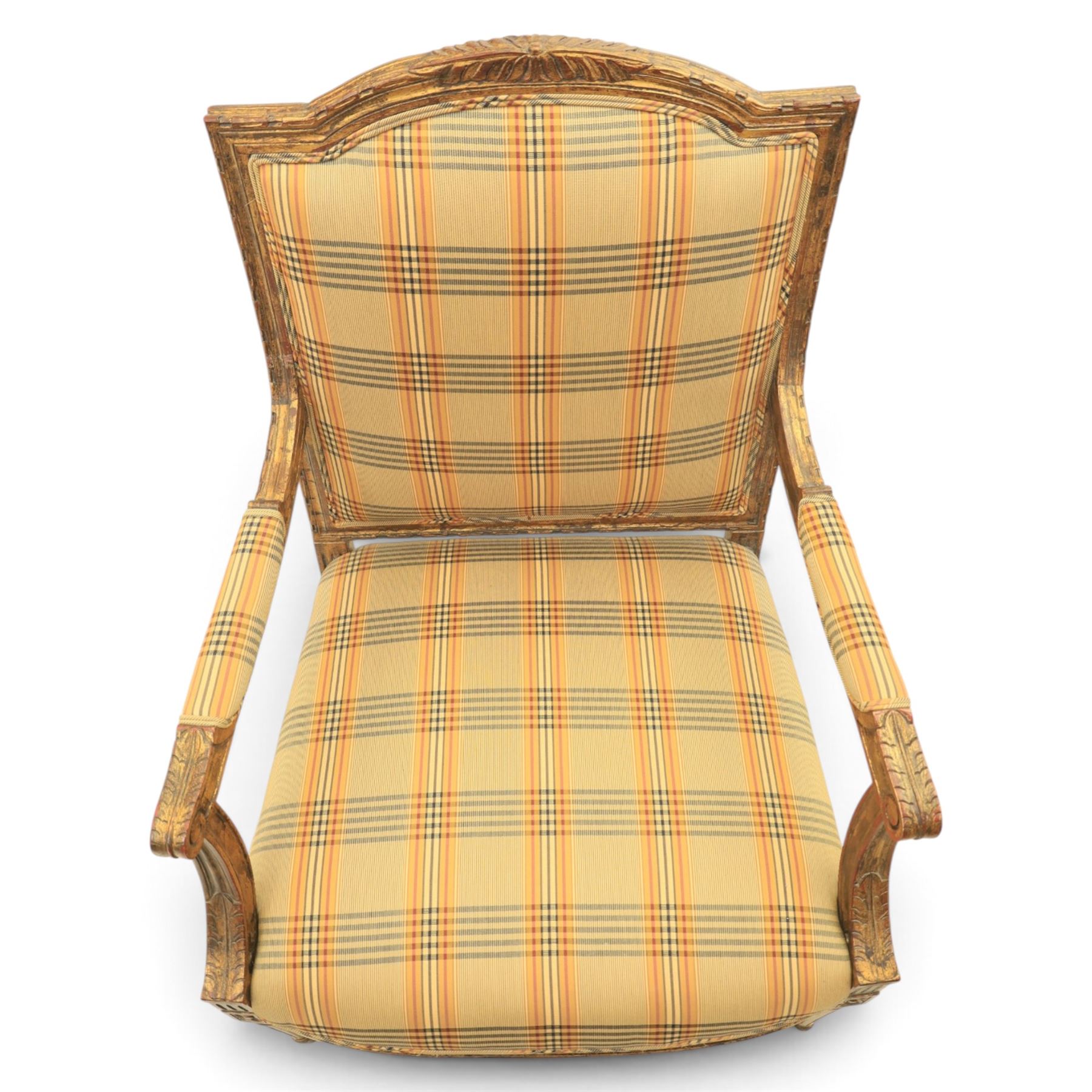 Louis XVI style painted fauteuil, the shaped padded back and overstuffed seat upholstered in cream tartan fabric, with scrolling open arms on fluted supports, the moulded frame with carved ribbon twist, rosette and husk decoration, raised on turned and fluted tapering legs
