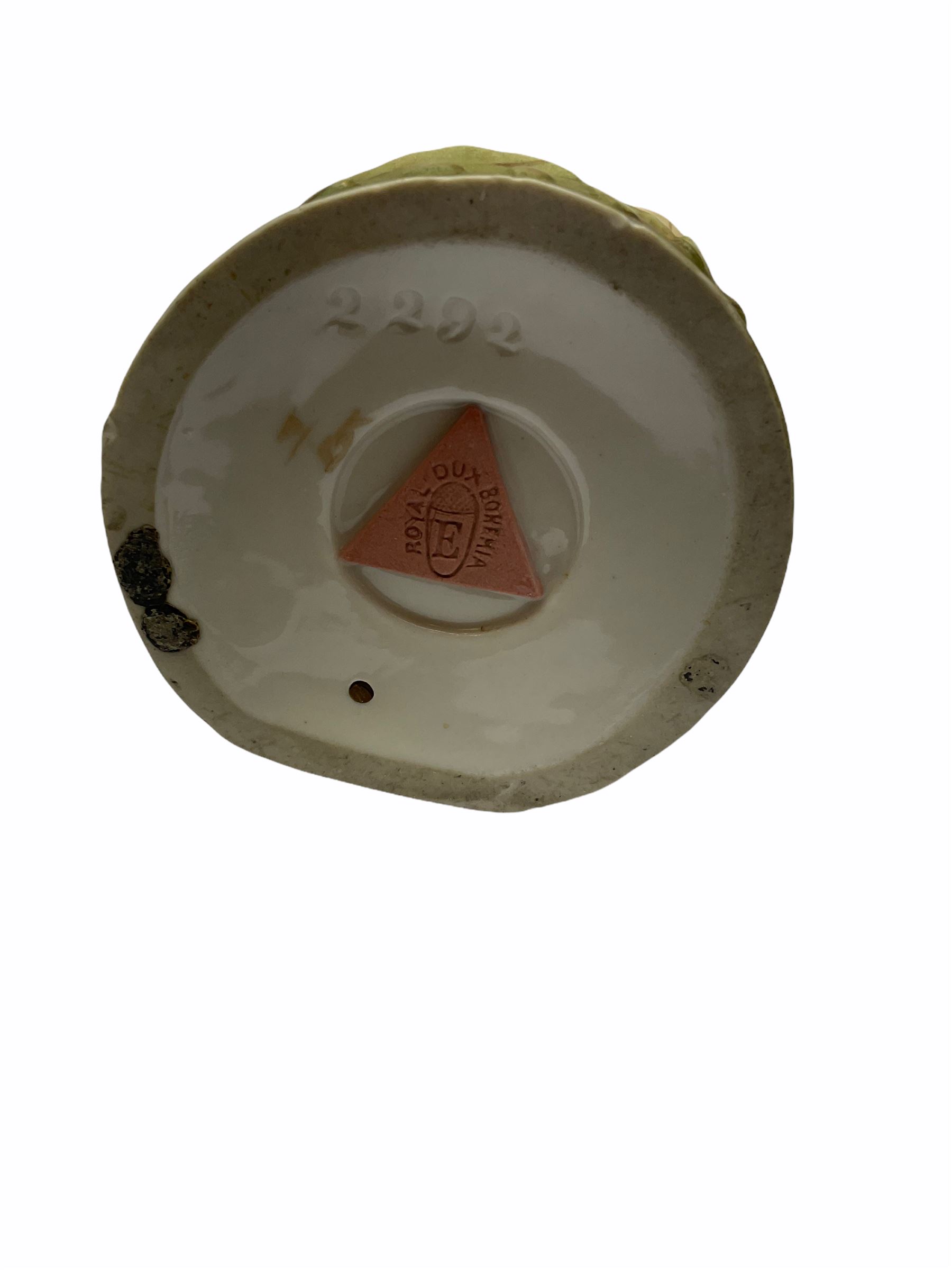 Royal Dux figure modelled as a fish seller, with applied triangle mark to the base and impressed model number 2292, H27cm, together with three Royal Dux style elephants, and a pair of Austrian Turn Wien figures, each carrying 'striker' baskets for matches. 