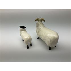 Collection of Beswick figures, comprising pig 'CH wall queen' 40 model no 1452a, black faced ewe model no 165, lamb model no 1828 and sitting fox 1748. 
