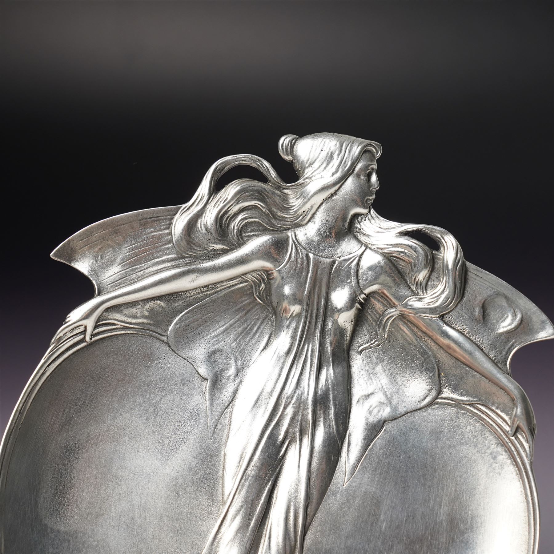 Art Nouveau pewter dish by Achille Gamba, modelled in the form of a female with arms outstretched, impressed no. 1282, H18cm 