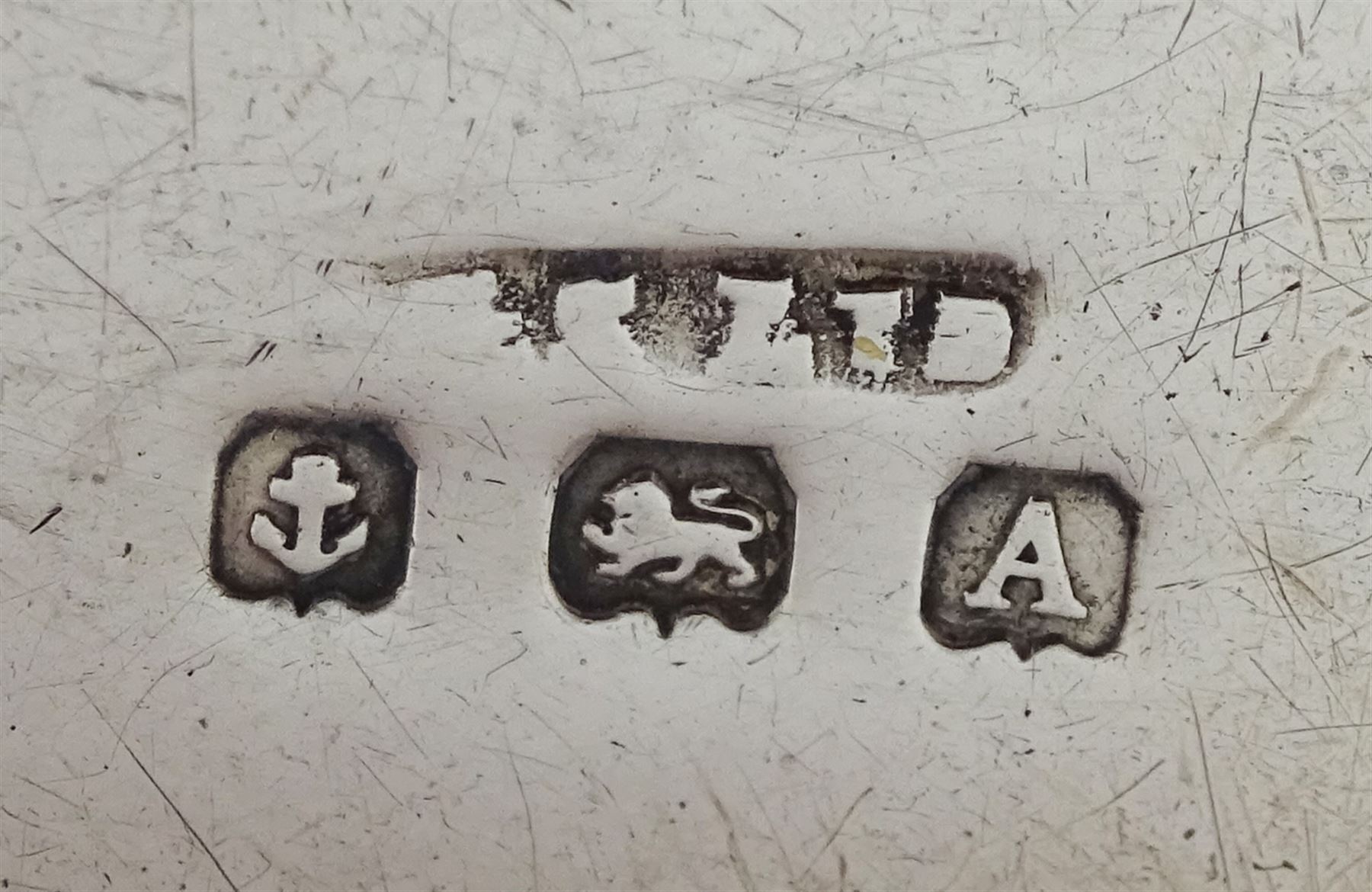 Edwardian silver sovereign holder by A & J Zimmerman Ltd,  Birmingham 1902, silver whistle by John Bettridge, Birmingham 1824, pair of silver knife rests by Josiah Williams & Co, London 1919, silver cheroot holder, Victorian 1889 silver crown, pill box and a silver Middle Eastern embossed mount