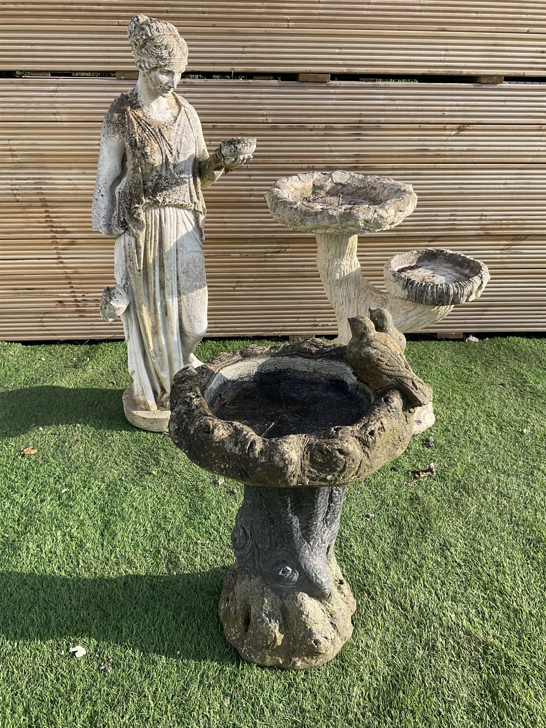 Cast stone garden figure and two bird baths  - THIS LOT IS TO BE COLLECTED BY APPOINTMENT FROM DUGGLEBY STORAGE, GREAT HILL, EASTFIELD, SCARBOROUGH, YO11 3TX