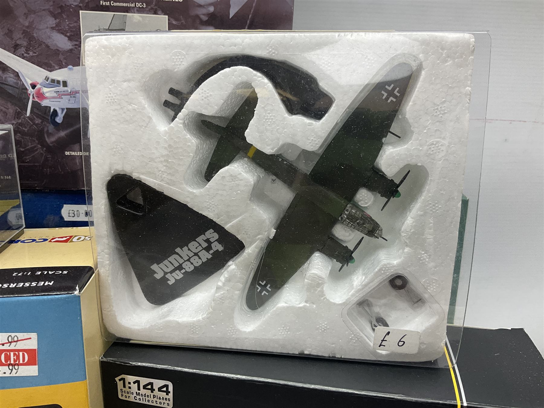 Fifteen modern die-cast models of aircraft by Corgi, Atlas Editions and Ixo including Aviation Archive, War Birds, Fighters of WWII etc; and model of an MGB Sports Car; all boxed (16)