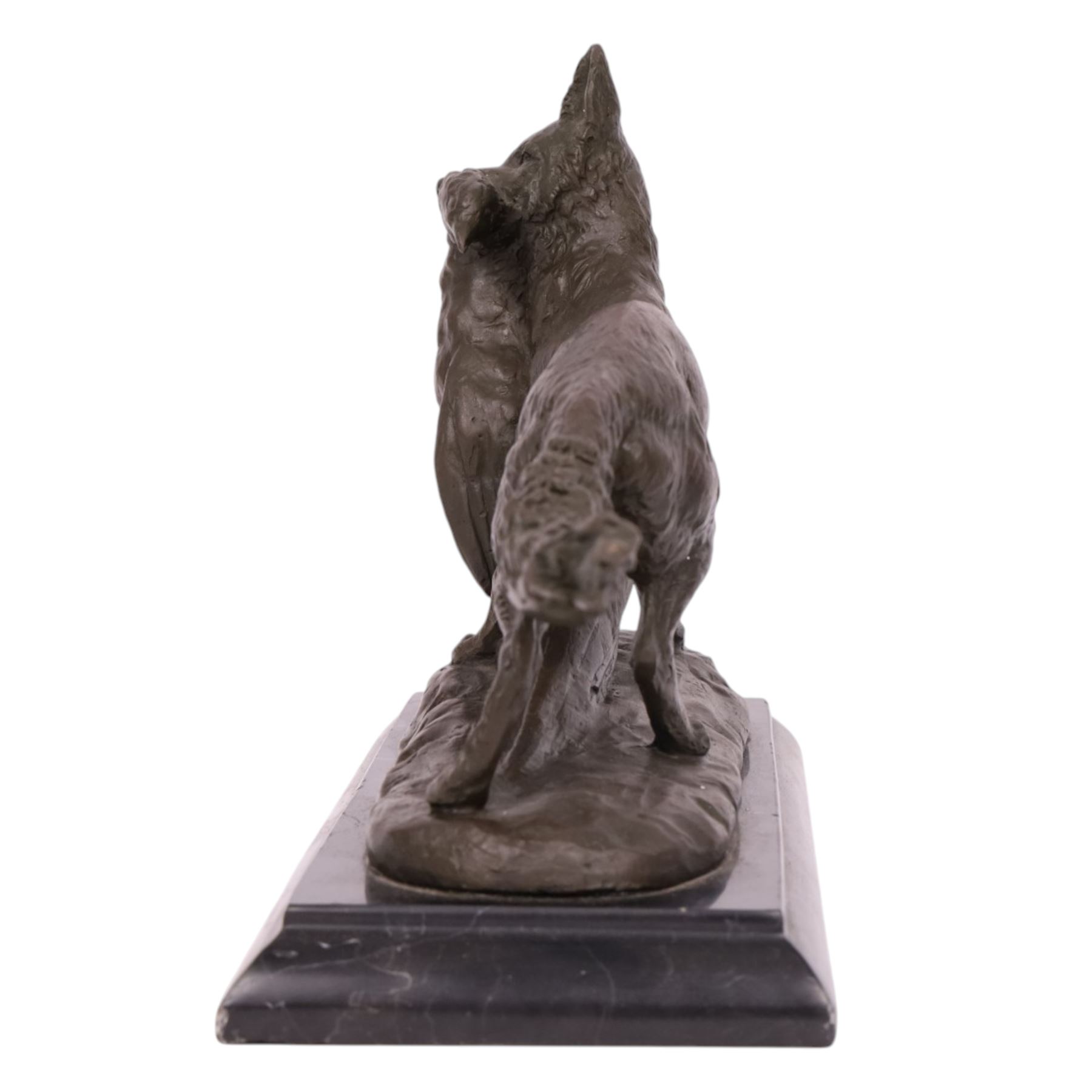 Composite figure of a fox with a pheasant in his mouth, upon a stepped marble base, H23cm, L28cm