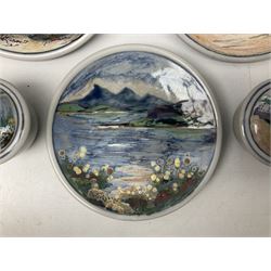 Highland Stoneware Scotland, decorated with landscapes and seascapes, comprising of two bowls, plate and two covered trinket boxes 