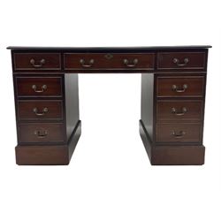 Georgian style mahogany twin pedestal desk, fitted with nine drawers