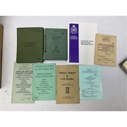 Collection of nineteen British Army booklets 1940s - 1970s including Small Arms Training 1944, various Infantry Training, Cadet Training Manual 1978, Signal Training, Commander's Aide Memoires etc; 1950s blue beret with Yorks Brigade badge; part travelling toilet set in cloth roll; all contained in pine box with webbing straps