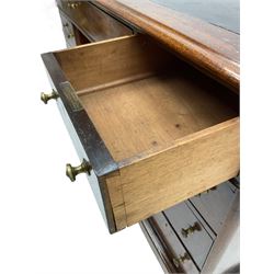Victorian mahogany twin pedestal desk, rectangular top with inset ebonised leather writing surface, fitted with nine graduating drawers with brass pull handles, on plinth bases