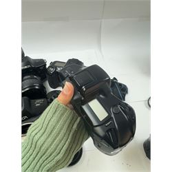 Six Minolta Dynax SLR camera bodies, comprising 800si serial no. 62703606, three 7xi examples, including one boxed example, serial nos. 20106944, 16123311 & 22107553, and two 9xi examples, serial no. 18209901 & 18202113, with three Minolta lenses, including Zoom xi 28-105mm 1:3.5(22)-4.5 lens, AF Zoom 28-85mm 1:3.5 (22)-4.5 lens and an AF Zoom 75-300mm 1:4.5(32)-5.6 lens, Hama carry case and other accessories