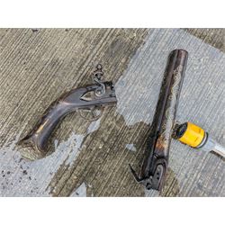 REGISTERED FIREARMS DEALERS ONLY - Reproduction flintlock pistol, the full walnut stock with brass filigree inlay and mounts and skull crusher butt L46cm; no visible proof marks - Disposed 25.06.25 - Notified 24.07.25