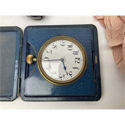 Cased Goliath type travelling clock; cased set of studs; Indian white metal multi-pod spice holder; quantity of continental embroidered collars and light bulbs